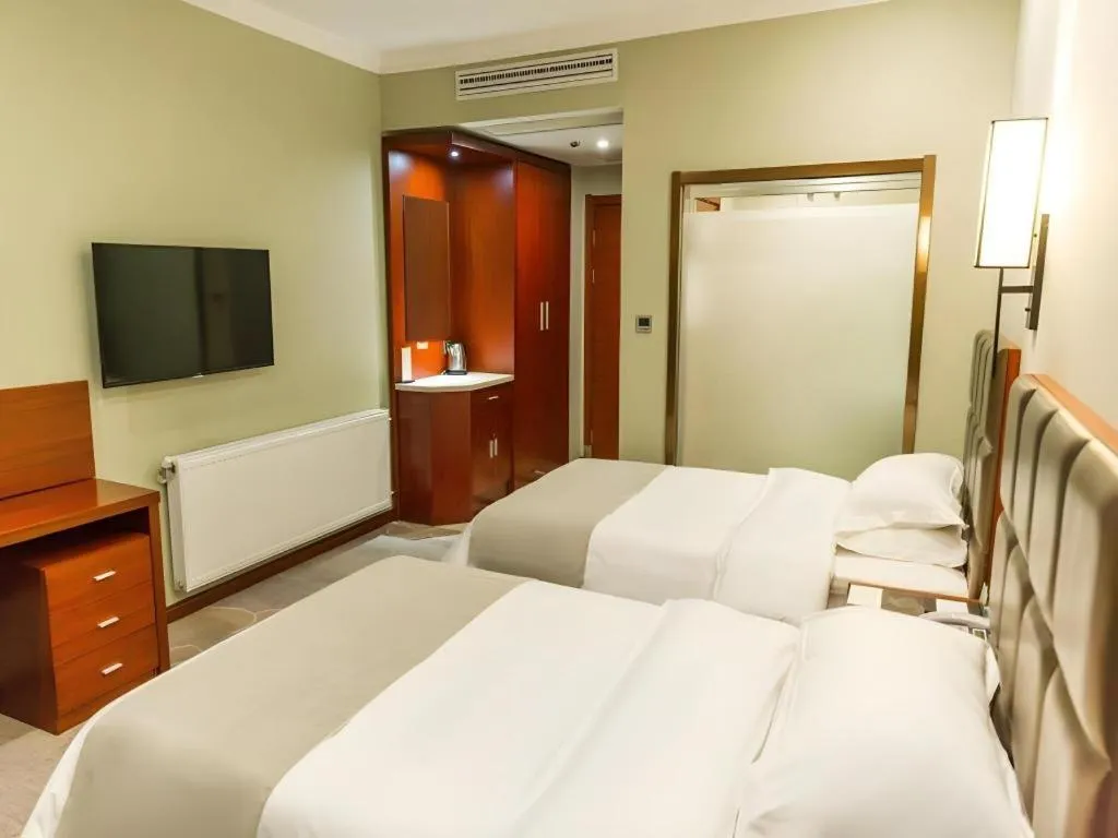 Bed in GreenTree Alliance Hotel Yancheng Engineering College Dayangwan Scenic Area