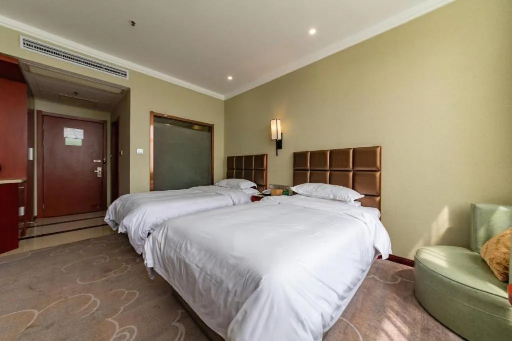 Bed in GreenTree Alliance Hotel Yancheng Engineering College Dayangwan Scenic Area