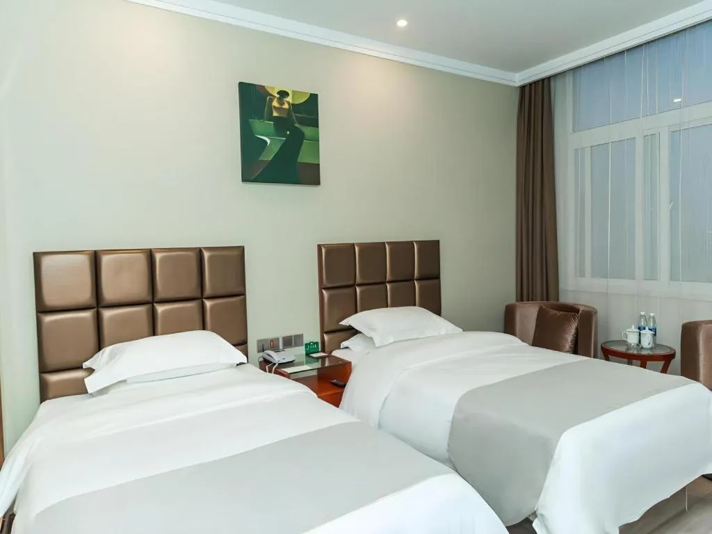 Bed in GreenTree Alliance Hotel Yancheng Engineering College Dayangwan Scenic Area