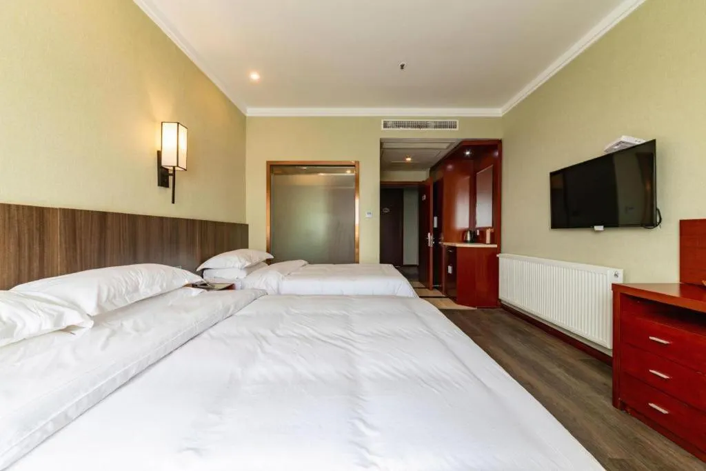 Bed in GreenTree Alliance Hotel Yancheng Engineering College Dayangwan Scenic Area