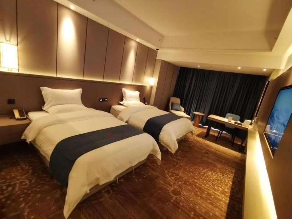 Bed in GreenTree Eastern Hotel Changge Yiwu City