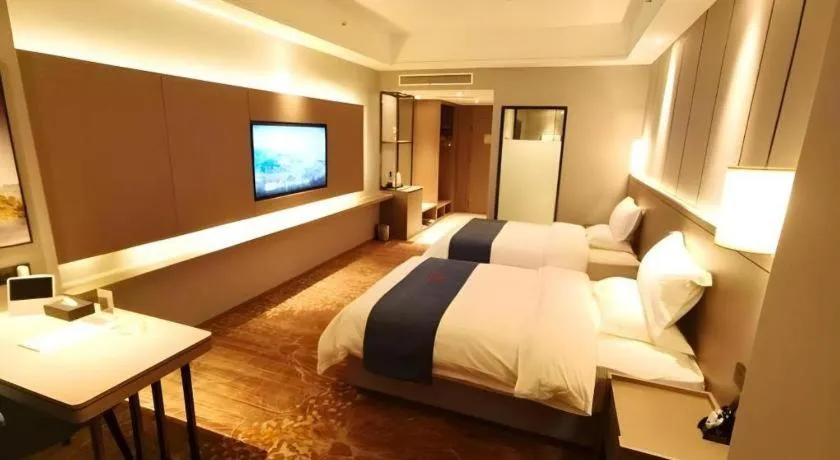 Bed in GreenTree Eastern Hotel Changge Yiwu City
