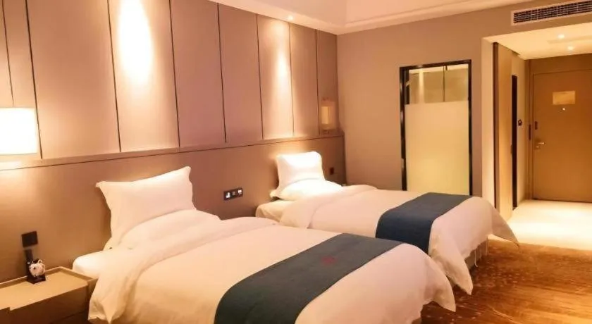 Bed in GreenTree Eastern Hotel Changge Yiwu City