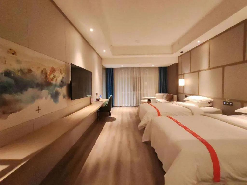 Bed in GreenTree Eastern Hotel Changge Yiwu City