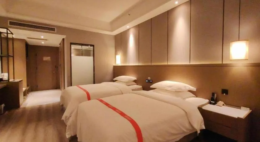 Bed in GreenTree Eastern Hotel Changge Yiwu City