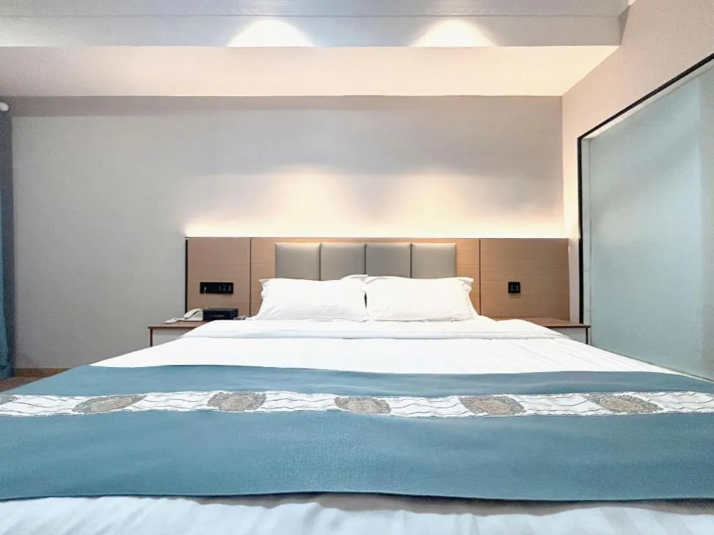 Bed in Shell Hotel Huaibei Jinying Plaza Long Distance Bus Station