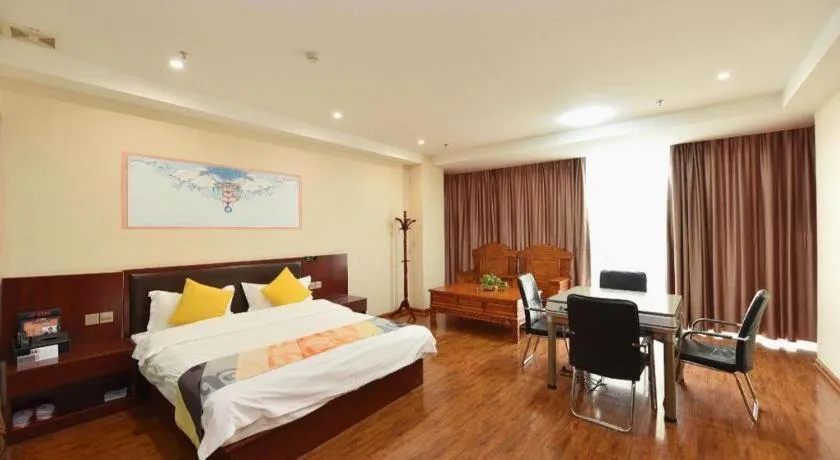 Bed in Shell Hotel Huainan Shou County Passenger Station Yaohai Grand Market