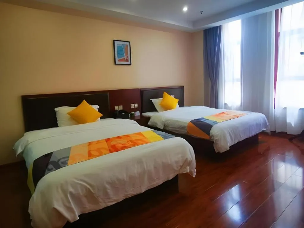 Bed in Shell Hotel Huainan Shou County Passenger Station Yaohai Grand Market