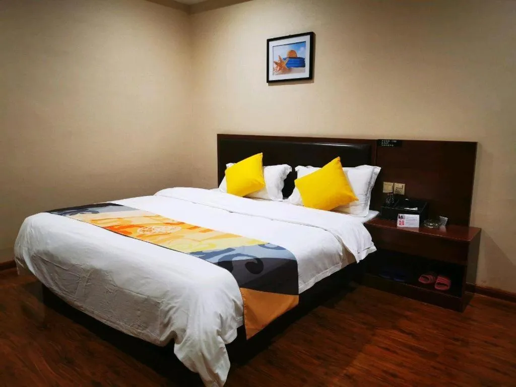Bed in Shell Hotel Huainan Shou County Passenger Station Yaohai Grand Market