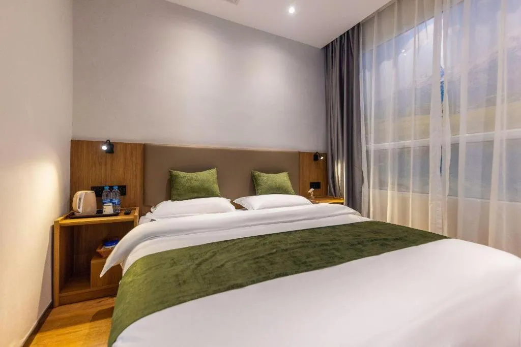 Bed in GreenTree Inn Express Lanzhou West Passenger Station Lanzhou Center