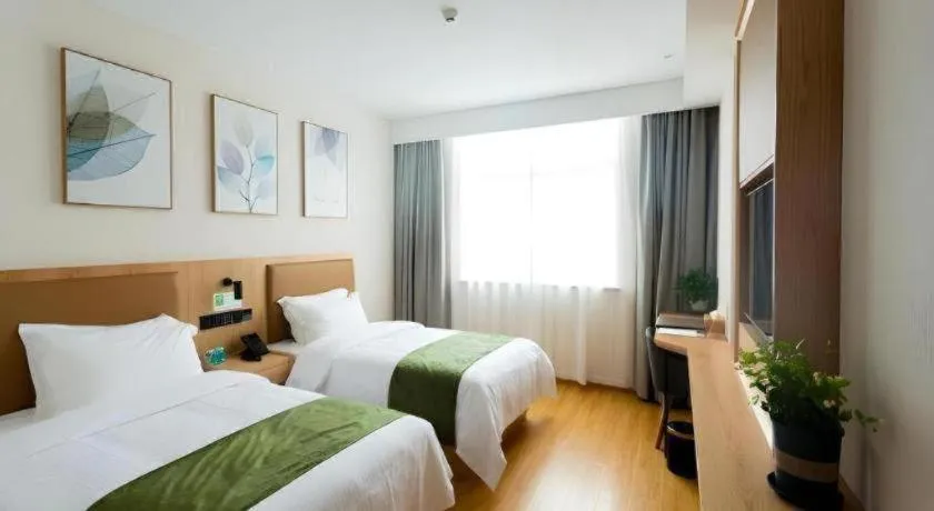 Bed in GreenTree Inn Express Henan Xinyang Huaibin County