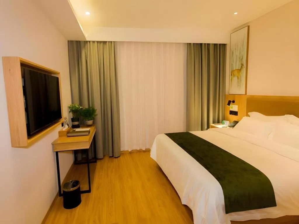 Bed in GreenTree Inn Express Henan Xinyang Huaibin County