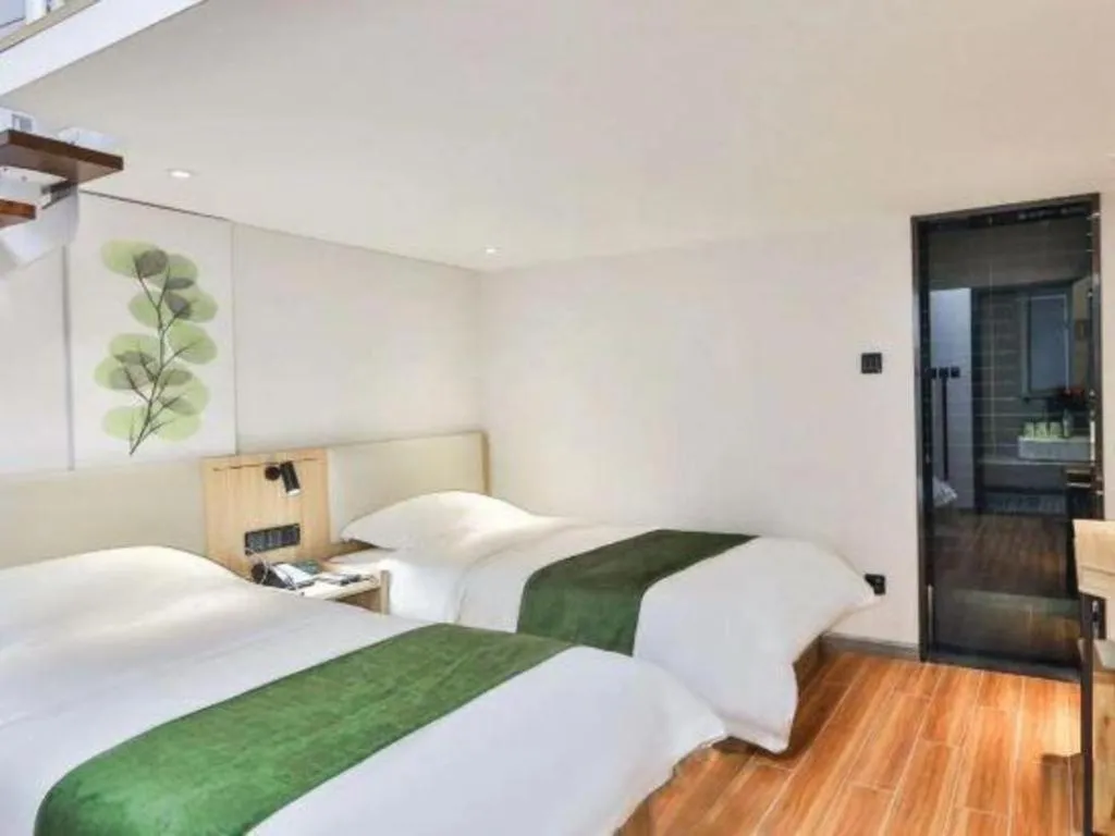 Bed in GreenTree Inn Express Beijing Dongcheng District Beixinqiao Metro Station Gui Street