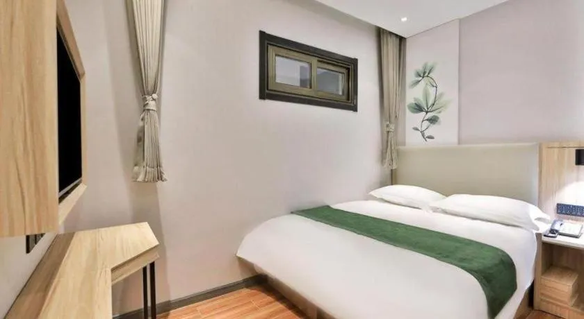 Bed in GreenTree Inn Express Beijing Dongcheng District Beixinqiao Metro Station Gui Street