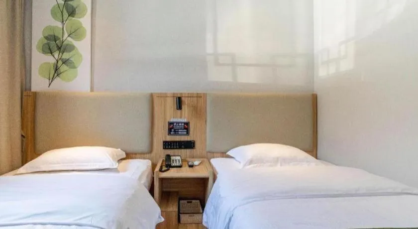 Bed in GreenTree Inn Express Beijing Dongcheng District Beixinqiao Metro Station Gui Street