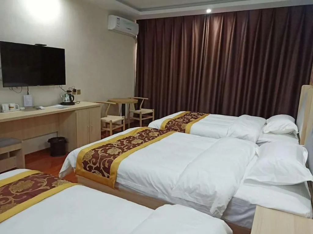 Bed in Super 8 Hotel Dingzhou Chongwen Street