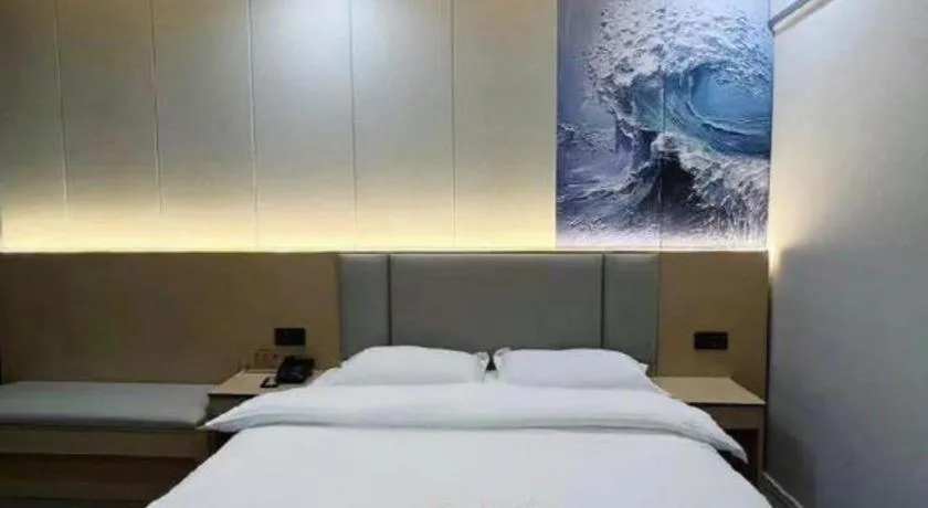 Bed in Super 8 Hotel Dingzhou Chongwen Street