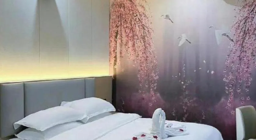 Bed in Super 8 Hotel Dingzhou Chongwen Street