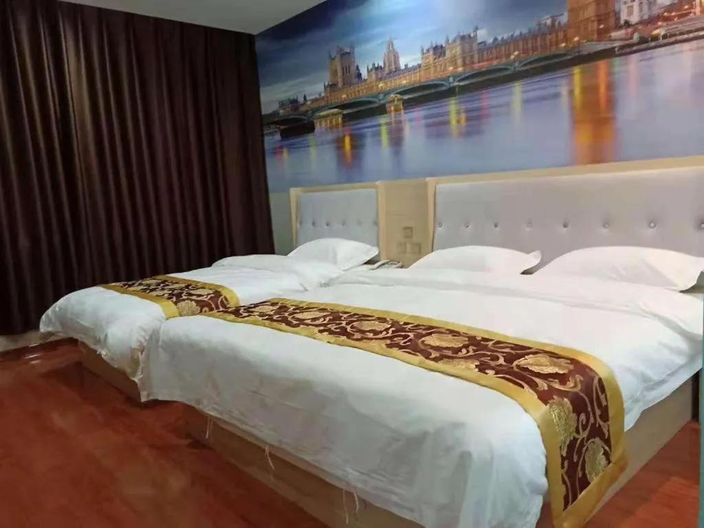 Bed in Super 8 Hotel Dingzhou Chongwen Street