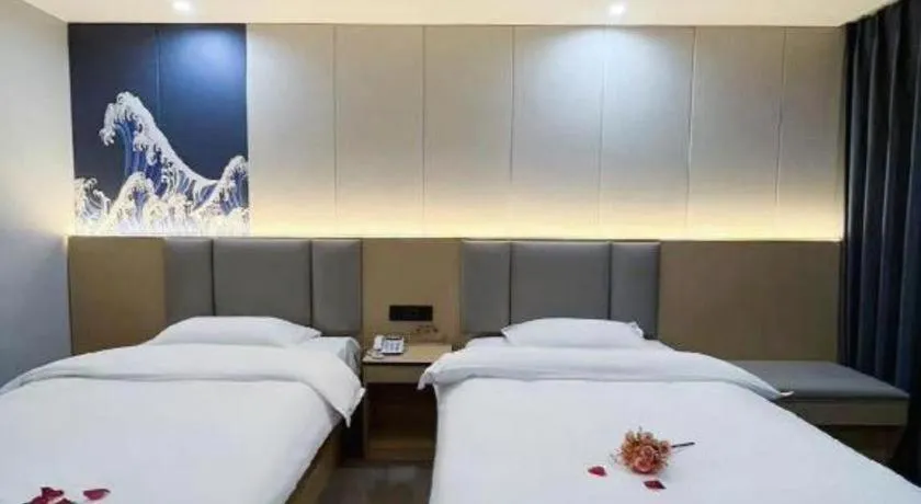 Bed in Super 8 Hotel Dingzhou Chongwen Street