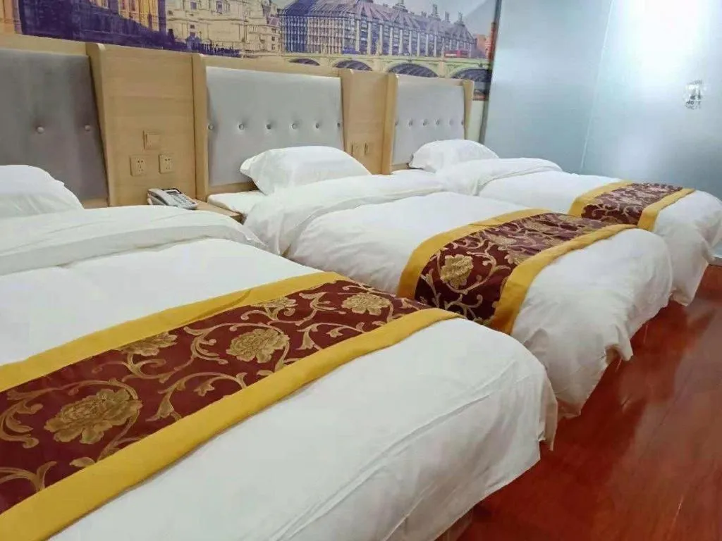 Bed in Super 8 Hotel Dingzhou Chongwen Street