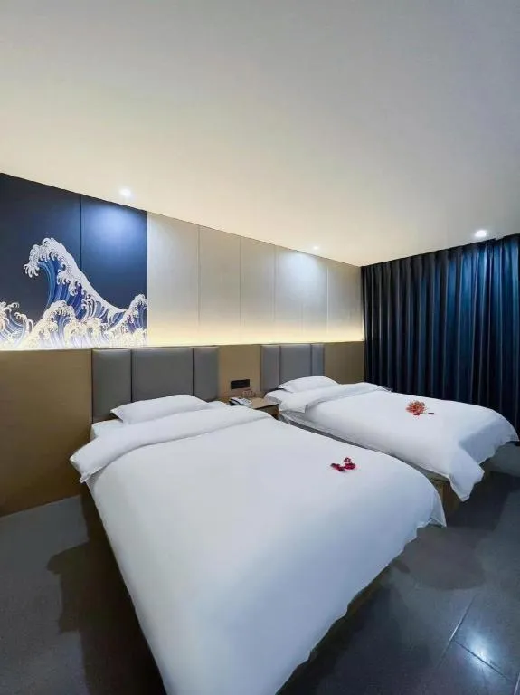 Bed in Super 8 Hotel Dingzhou Chongwen Street