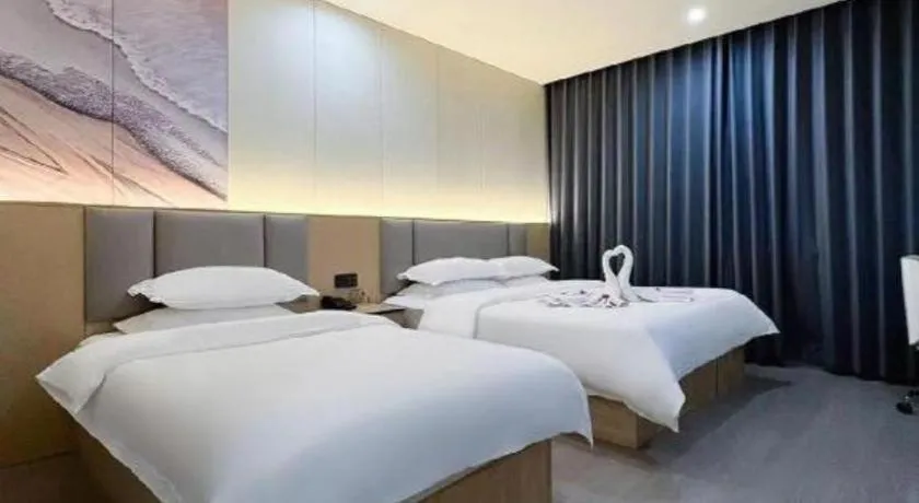 Bed in Super 8 Hotel Dingzhou Chongwen Street