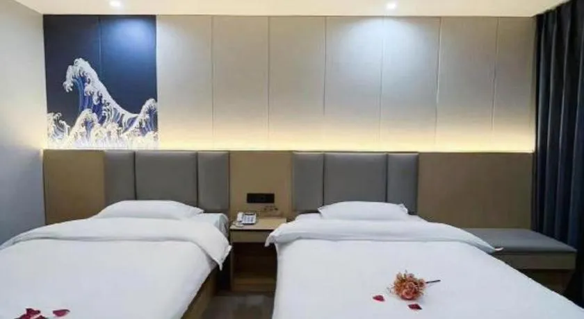 Bed in Super 8 Hotel Dingzhou Chongwen Street