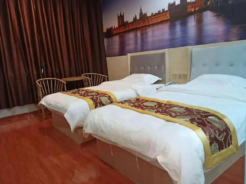 Bed in Super 8 Hotel Dingzhou Chongwen Street
