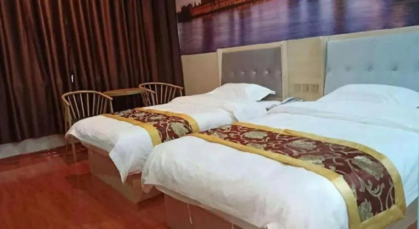 Bed in Super 8 Hotel Dingzhou Chongwen Street