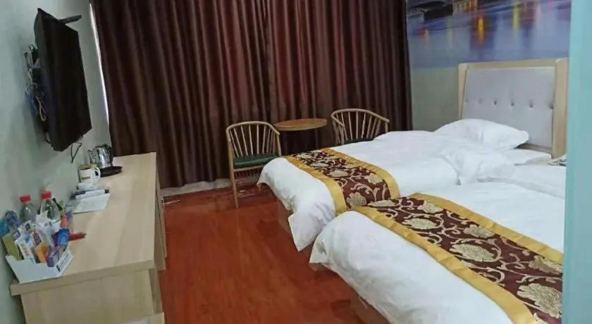 Bed in Super 8 Hotel Dingzhou Chongwen Street