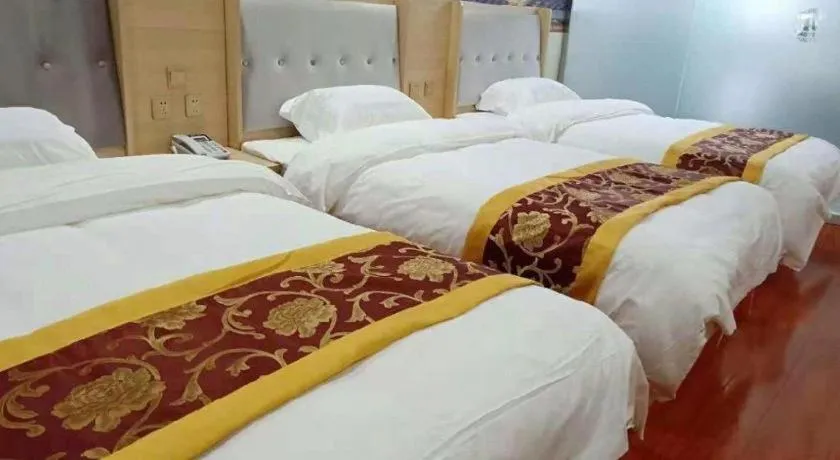 Bed in Super 8 Hotel Dingzhou Chongwen Street