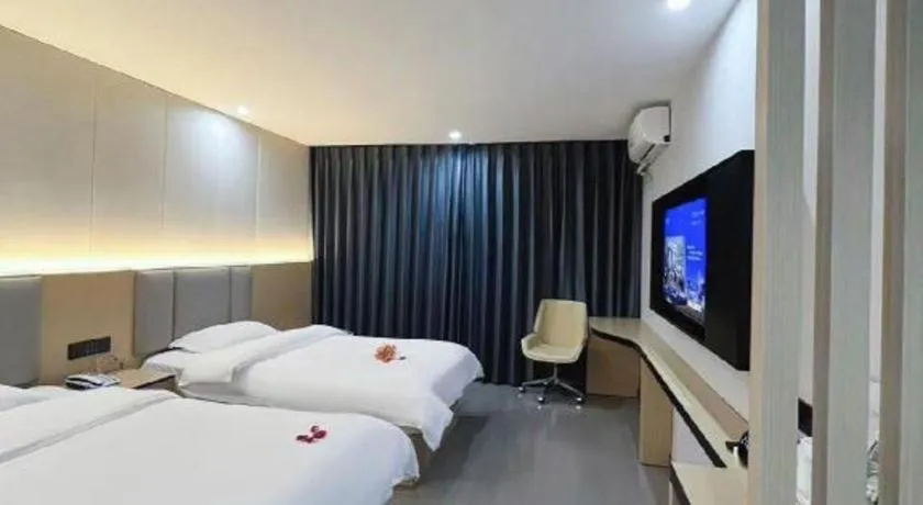 Bed in Super 8 Hotel Dingzhou Chongwen Street