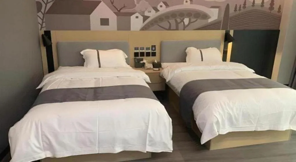 Bed in Thank Inn Jiangxi Nanchang Anyi County Fenghuangshan Industrial Park