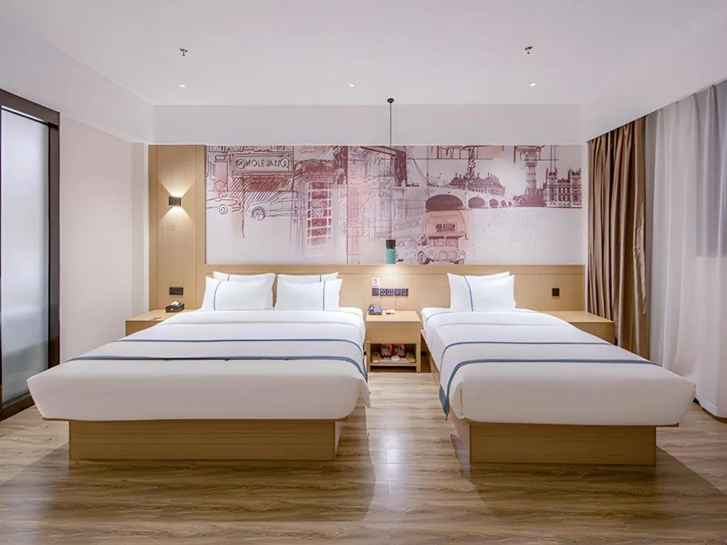 Bed in City Comfort Inn Wuzhou Xijiang Thrid Bridge