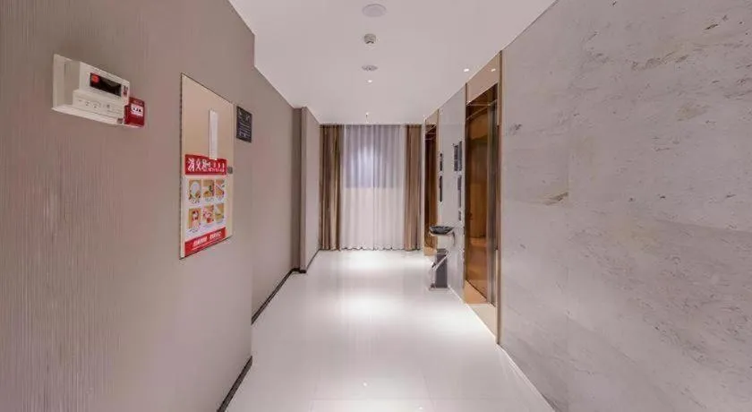 Bed in City Comfort Inn Wuzhou Xijiang Thrid Bridge