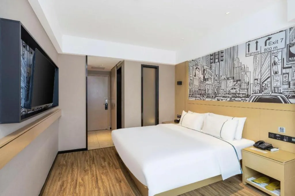 Bed in City Comfort Inn Yunfu Xinxing Juncheng Plaza