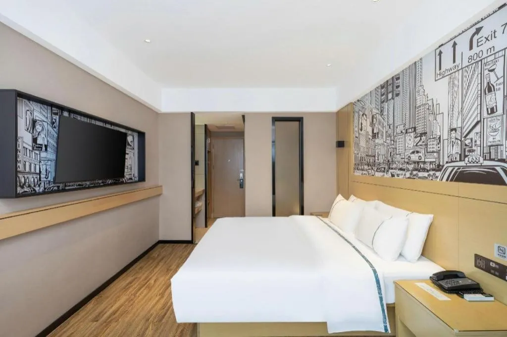 Bed in City Comfort Inn Yunfu Xinxing Juncheng Plaza