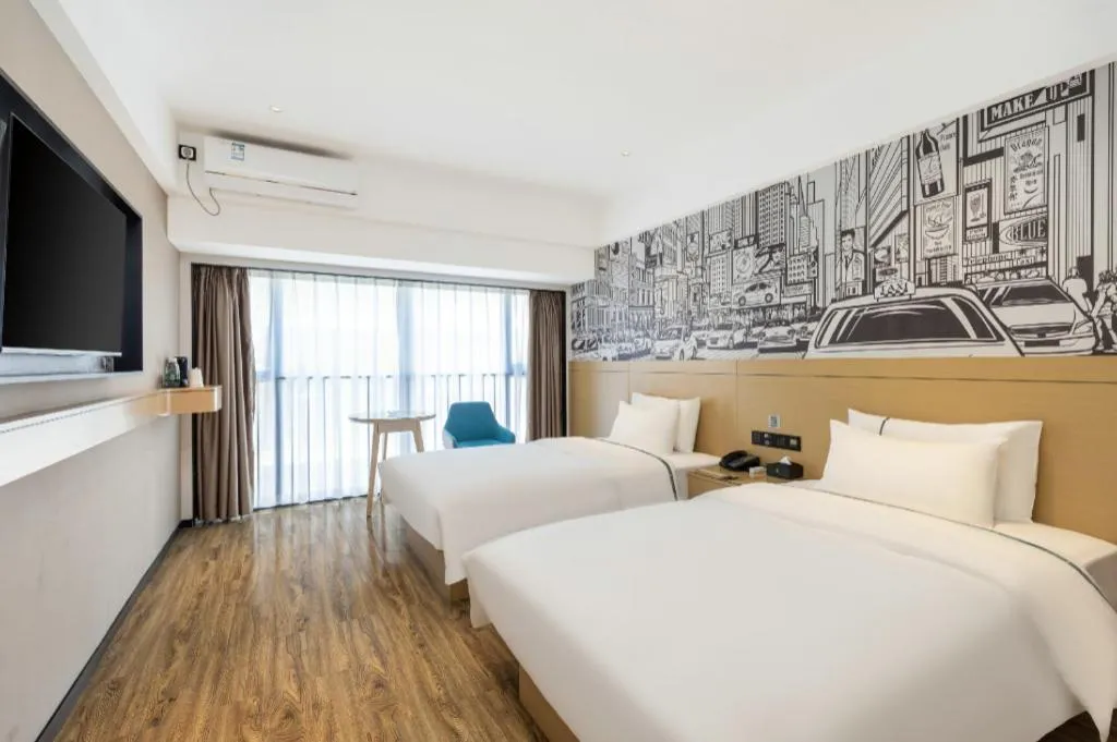 Bed in City Comfort Inn Yunfu Xinxing Juncheng Plaza