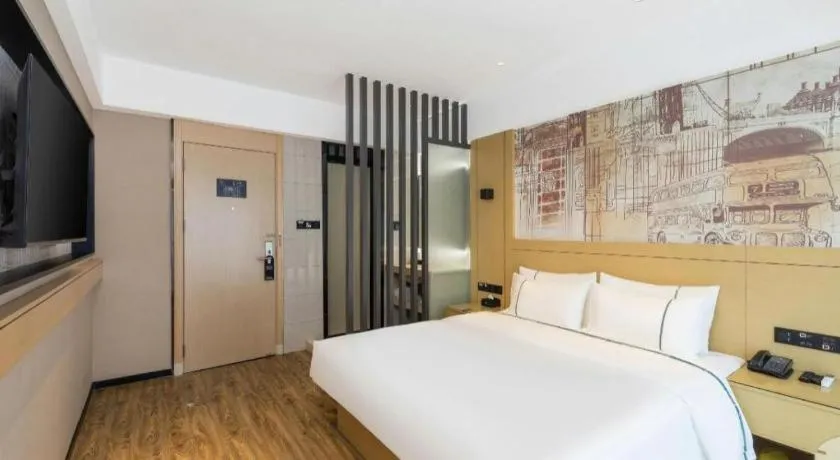 Bed in City Comfort Inn Yunfu Xinxing Juncheng Plaza