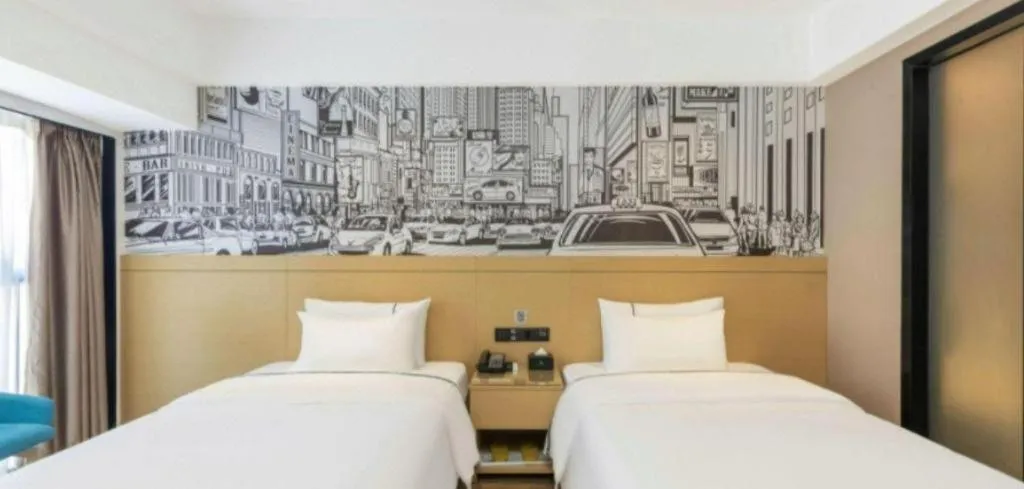 Bed in City Comfort Inn Yunfu Xinxing Juncheng Plaza