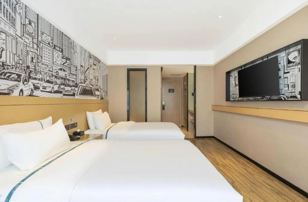 Bed in City Comfort Inn Yunfu Xinxing Juncheng Plaza