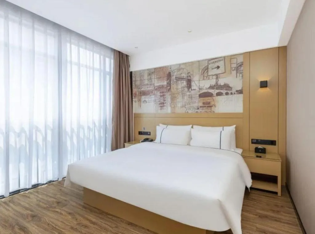 Bed in City Comfort Inn Yunfu Xinxing Juncheng Plaza