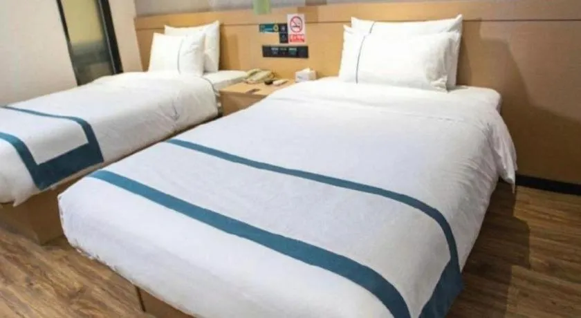 Bed in City Comfort Inn Yunfu Xinxing Juncheng Plaza
