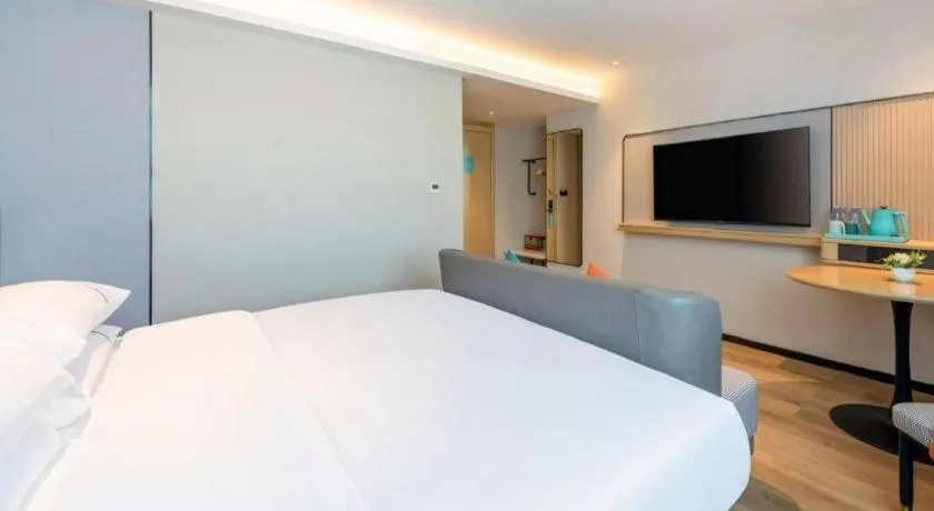 Bed in City Comfort Inn Yunfu Xinxing Juncheng Plaza