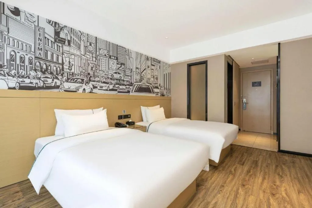 Bed in City Comfort Inn Yunfu Xinxing Juncheng Plaza