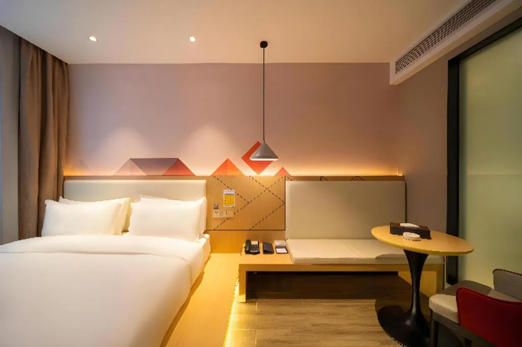 Bed in Borrman Hotel Yongzhou High Speed Railway Station