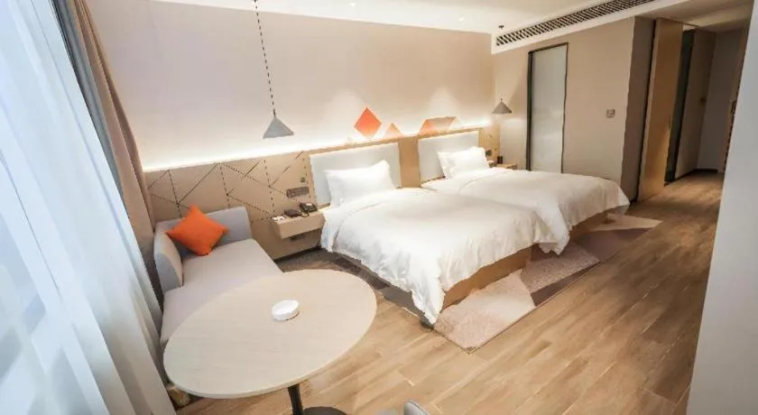 Bed in Borrman Hotel Yongzhou High Speed Railway Station