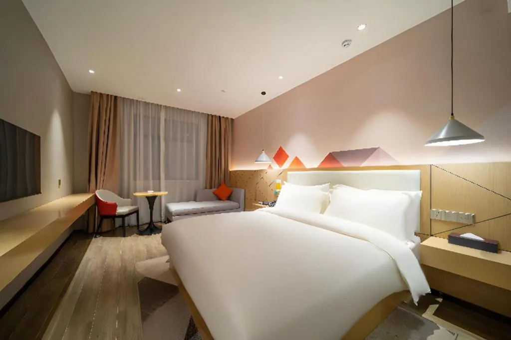 Bed in Borrman Hotel Yongzhou High Speed Railway Station