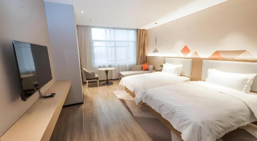 Bed in Borrman Hotel Yongzhou High Speed Railway Station